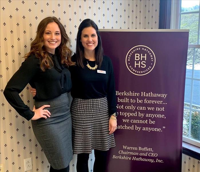 two female SERVPRO employees at Berkshire Hathaway event