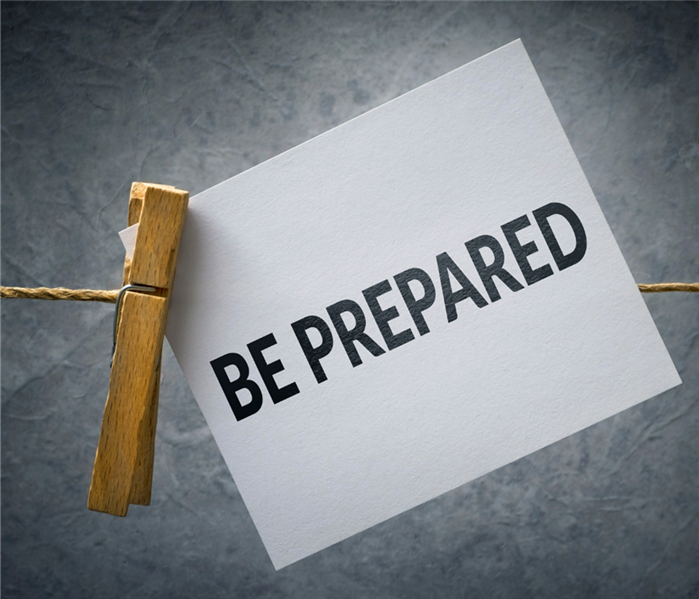 A close pin holds a sign that says "Be Prepared"