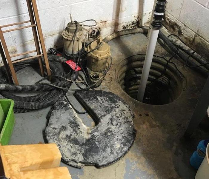 image of failed sump pump in Cortland, OH basement