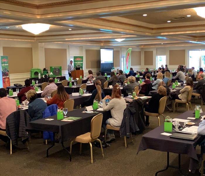image of a room full of insurance agents taking a continuing education course offered by SERVPRO