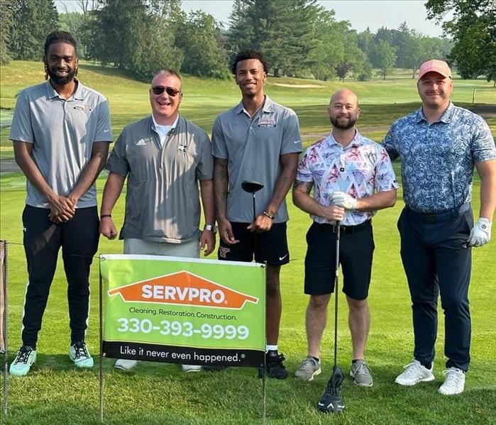 SERVPRO Team Dobson golfs with Warren JFK